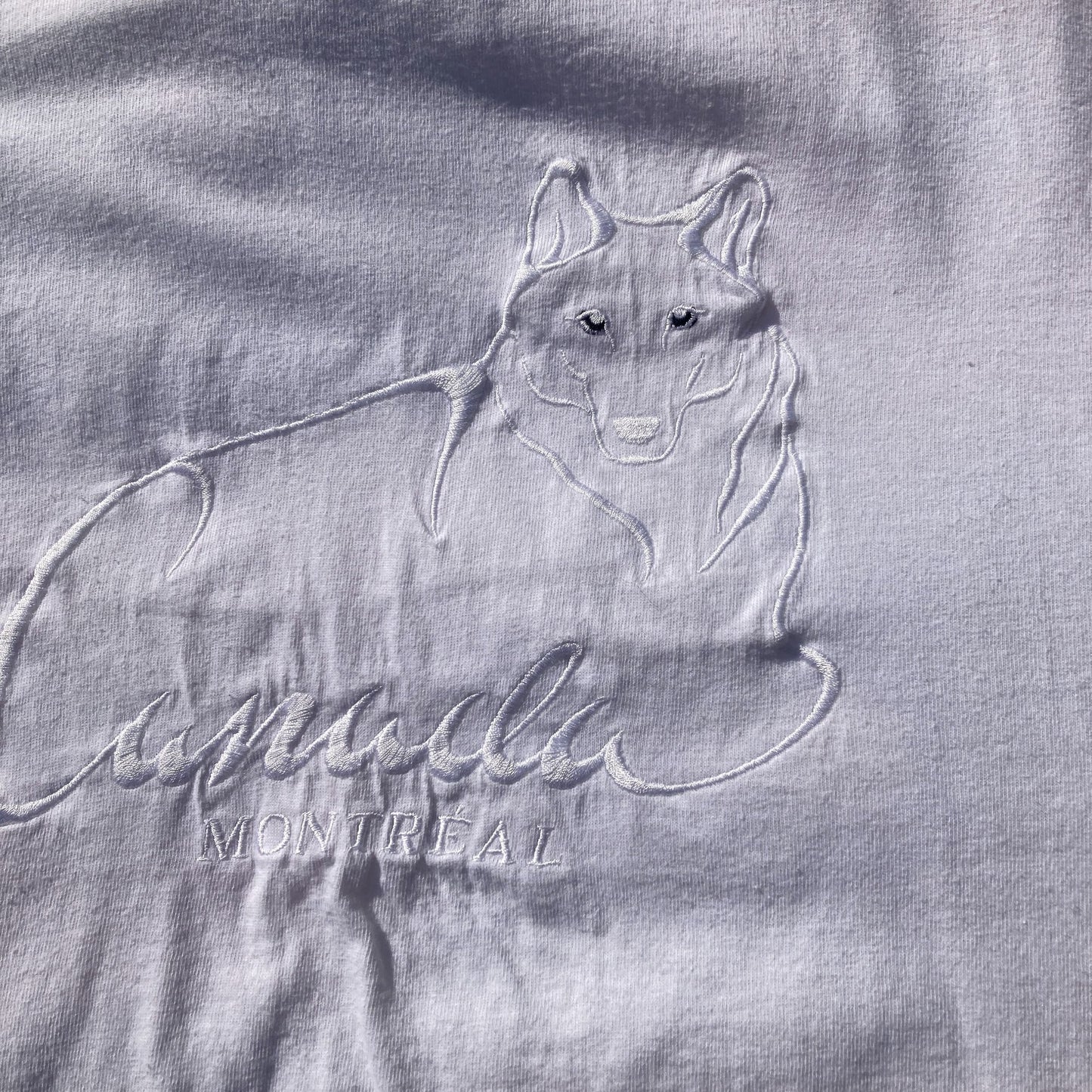 Vintage t shirt 90s wolf embroidered Montreal destination white on white Cityscape 1990s