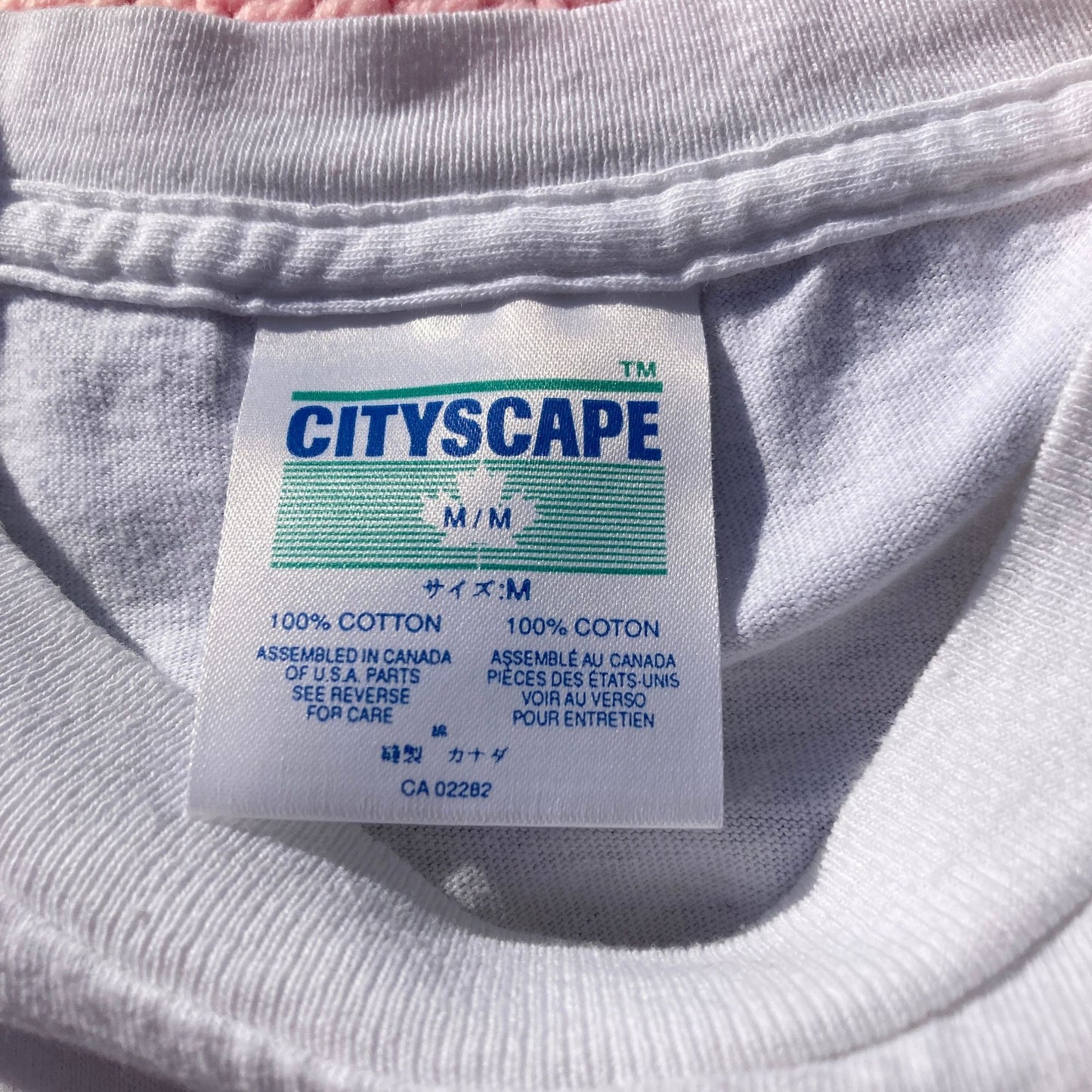 Vintage t shirt 90s wolf embroidered Montreal destination white on white Cityscape 1990s